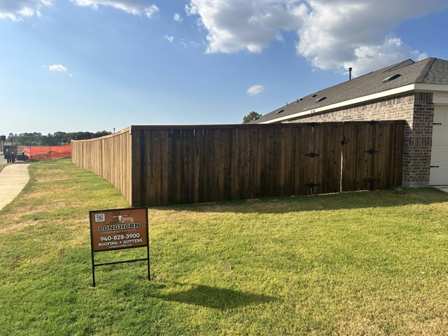 Wood fence and exterior fence line.