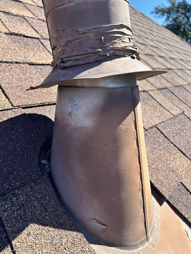 Damaged roof vent flashing detail.